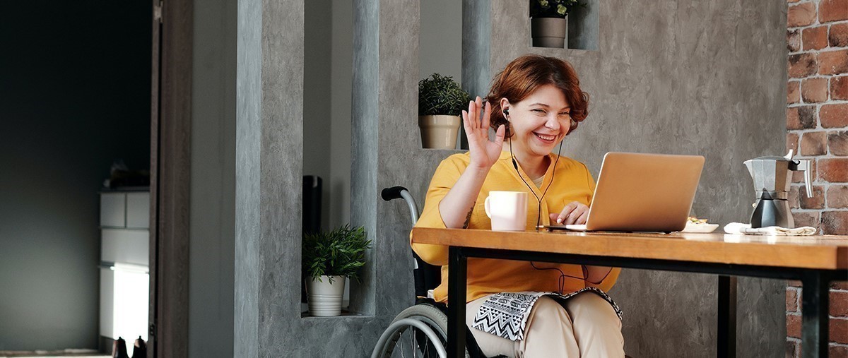 Woman in Wheel Chair on Computer