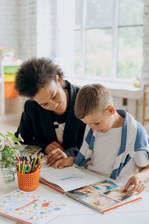 Teacher Reading to Child